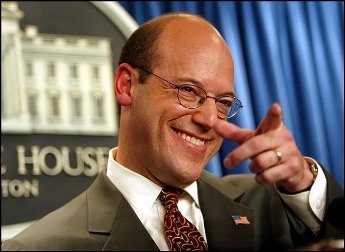 Fleischer, at press conference pointing to reporter; looks like thumb touching nose and index finger extended